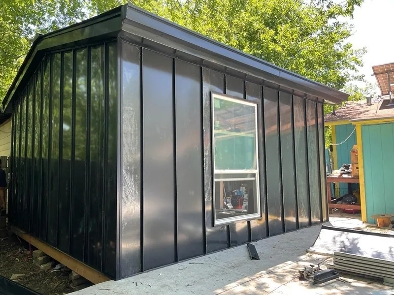 Black standing seam metal wall panels for Roof Inspection in Kailua-Kona
