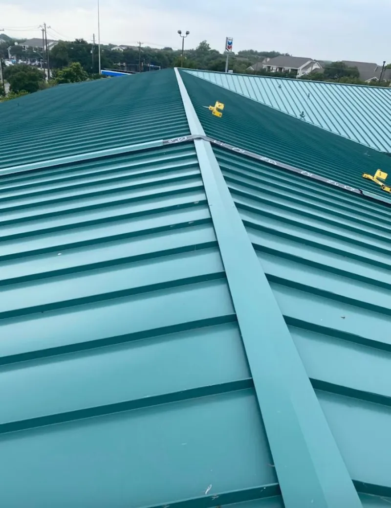 Green commercial metal roof ridge and valley for Metal Roof Repair in Kailua-Kona