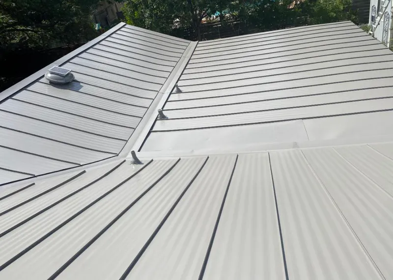 Solar attic fan installed on a metal roof for Roof Ventilation in Kailua-Kona