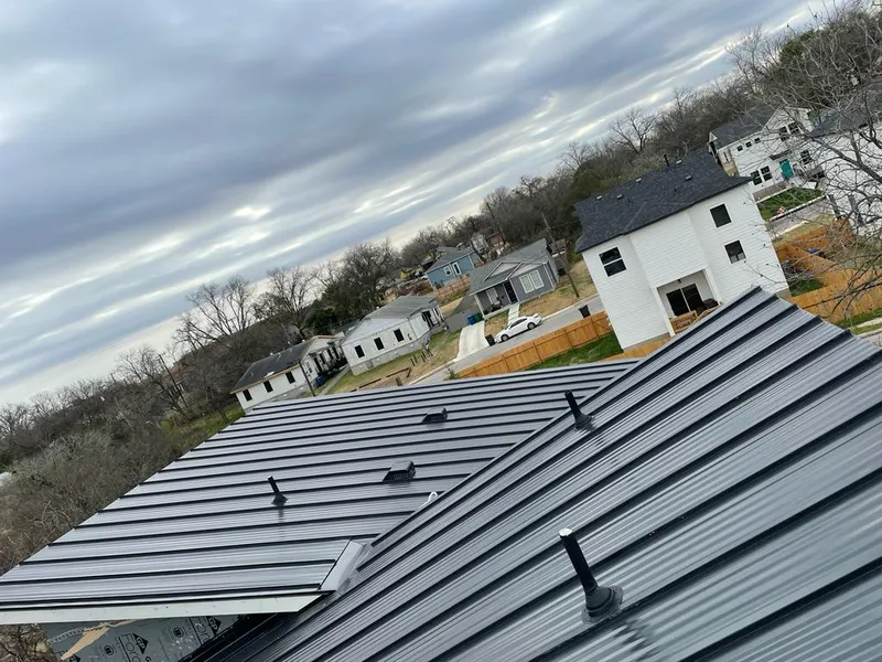 Standing seam metal roof panels with vents for Skylight Repair in Kailua-Kona